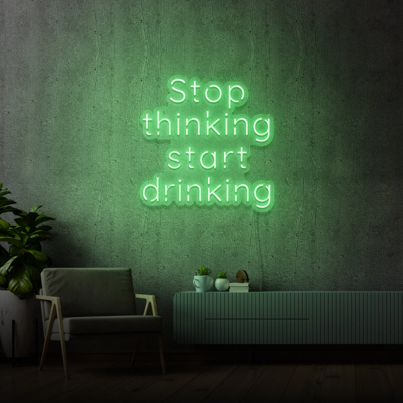 'STOP THINKING START DRINKING' - segnaletica a LED al neon