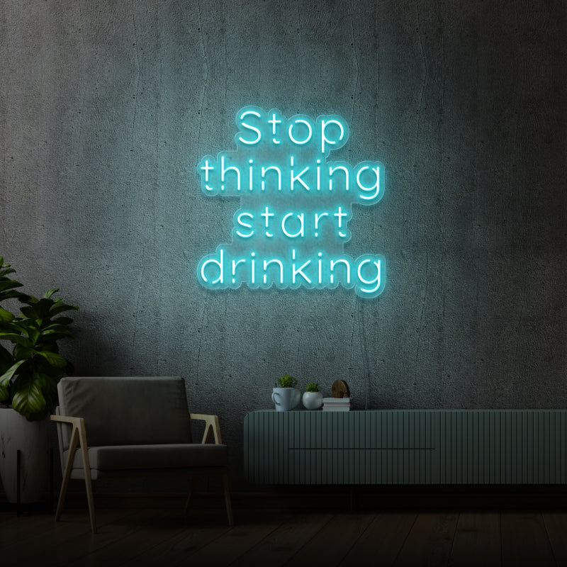 'STOP THINKING START DRINKING' - segnaletica a LED al neon