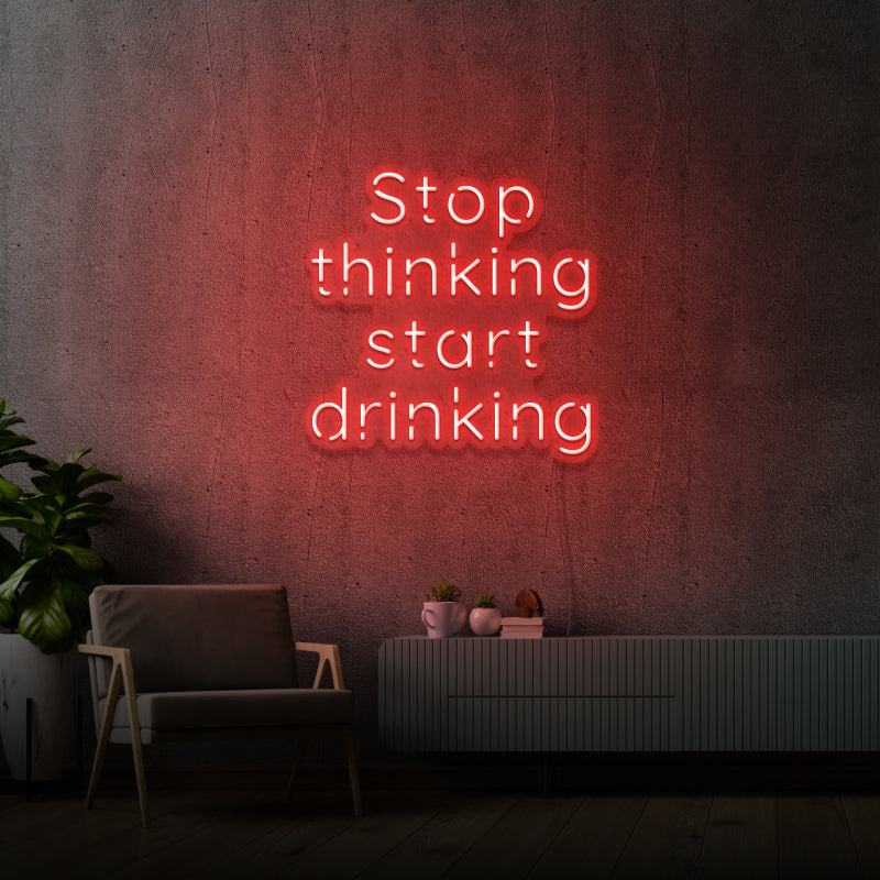 'STOP THINKING START DRINKING' - segnaletica a LED al neon