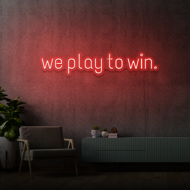 „WE PLAY TO WIN“ – LED-Neonschild