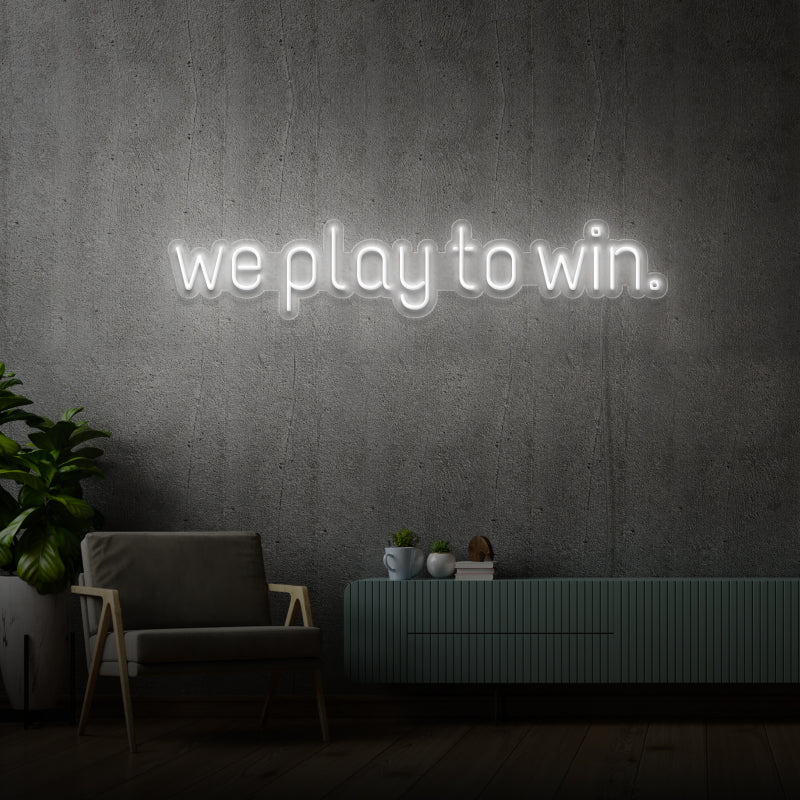 „WE PLAY TO WIN“ – LED-Neonschild